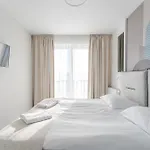 Apartment Riverside Comfort By Bookinghost